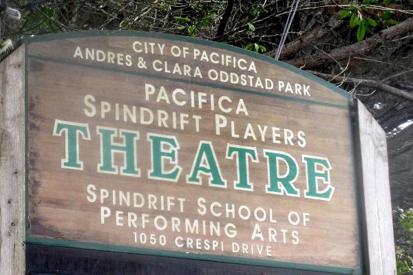 A theater sign for Pacifica Spindrift Players at Andres & Clara Oddstad Park, located at 1050 Crespi Drive.